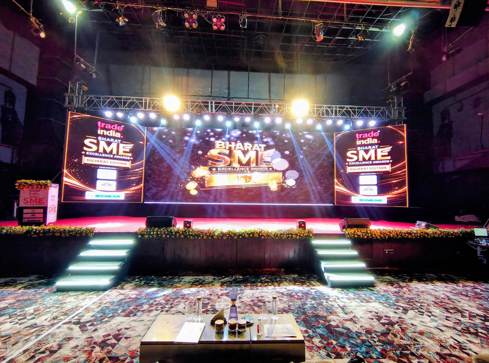 Grand wedding and celebration stage with radiant lights and giant LED backdrop